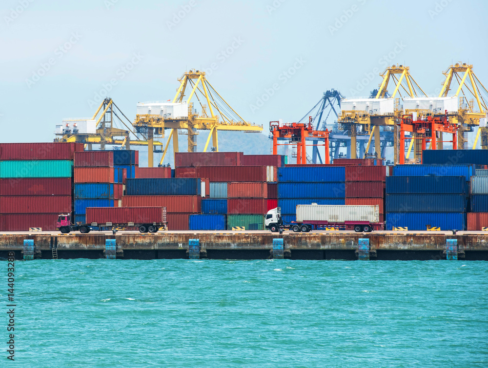 container ship in import export and business logistic.By crane ,Trade Port , Shipping, cargo to harb