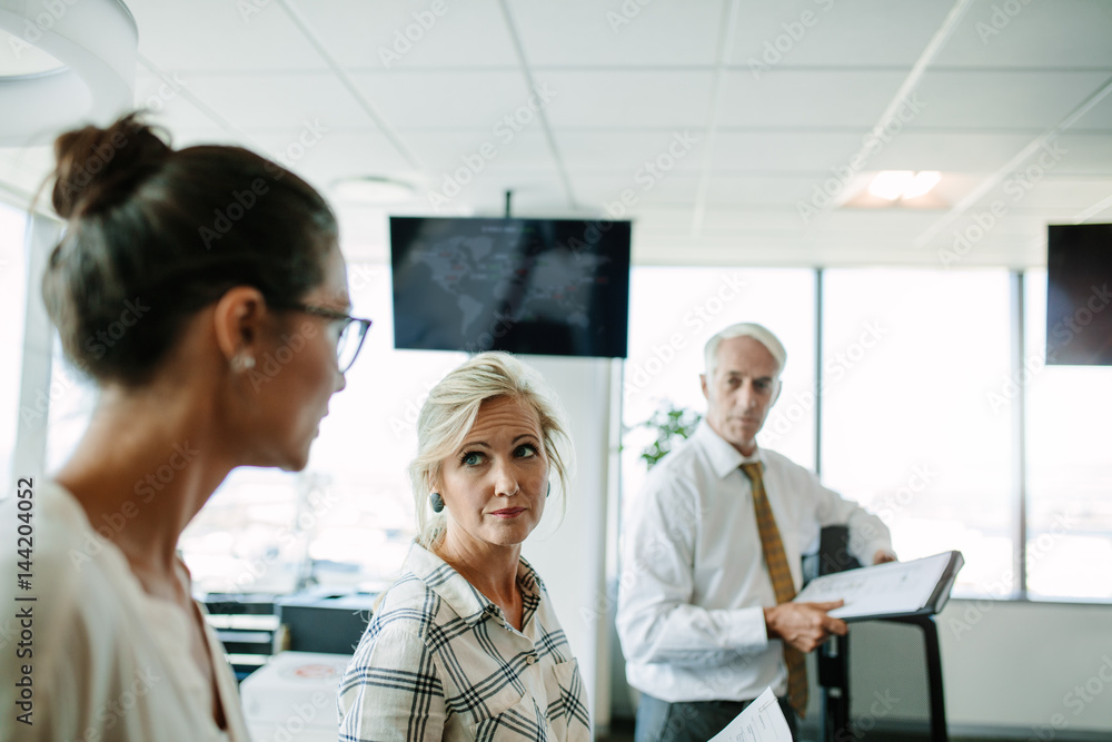 Business people having a informal meeting in modern office