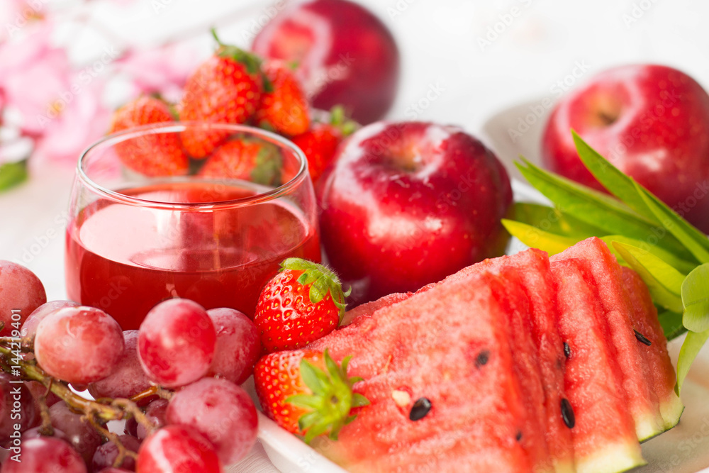 Fresh red fruit mix and juice for healthy