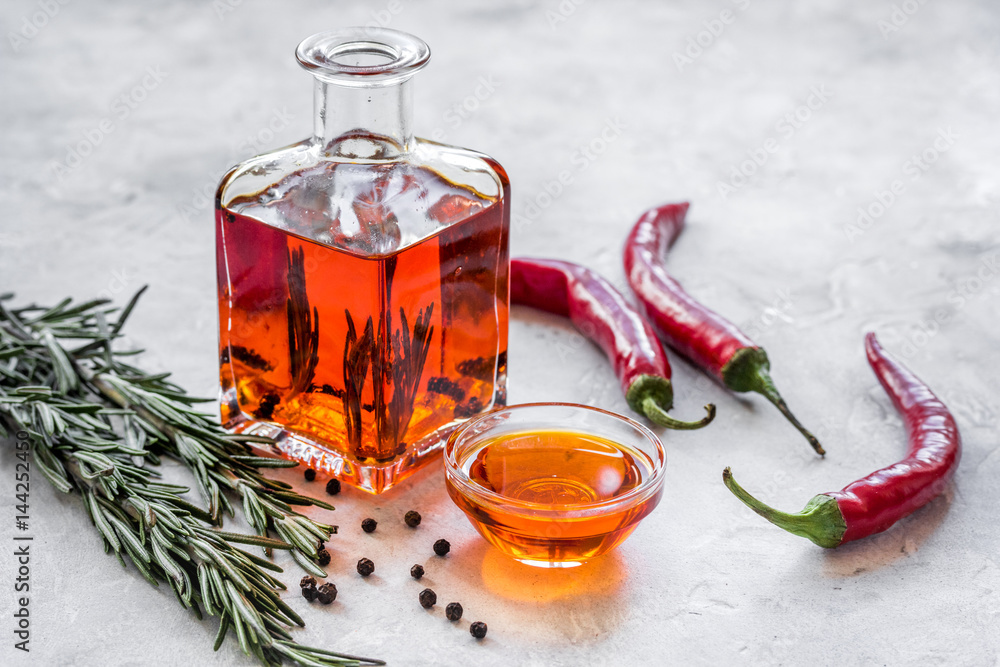 natural oils concept with fresh chili paper on table background