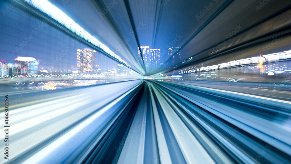 rail track and cityscape of tokyo from speed train