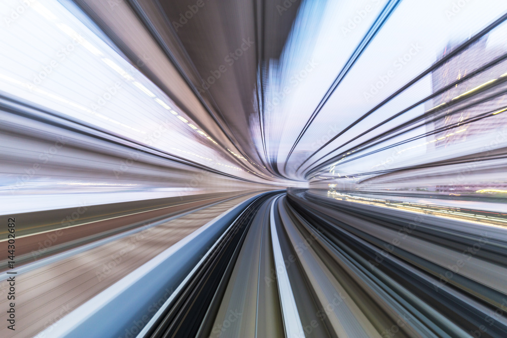 rail track and cityscape of tokyo from speed train