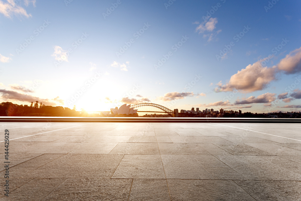 empty floor with bridge and cityscape of modern city