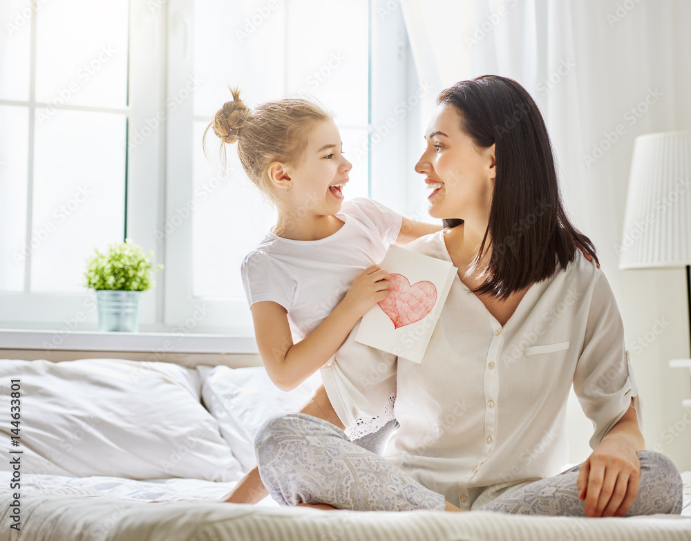 daughter congratulates mom