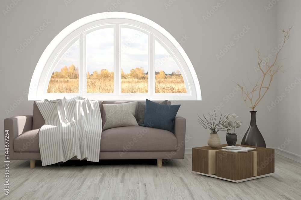 White room with sofa and autumn landscape in window. Scandinavian interior design. 3D illustration