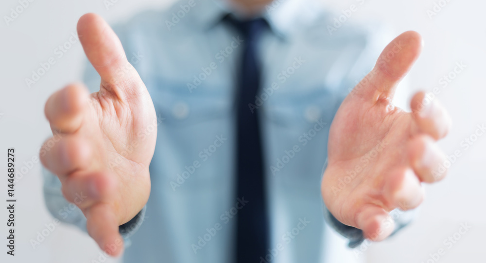 Businessman showing his empty hand