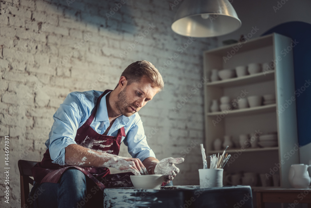 Worker in pottery