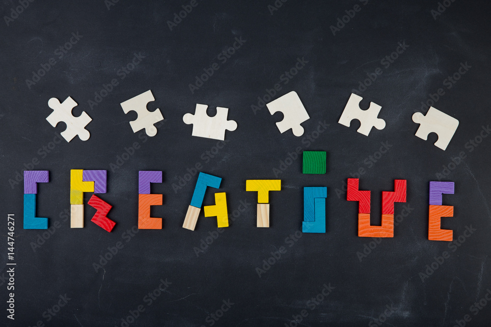 Business creative solution concept jigsaw on the blackboard