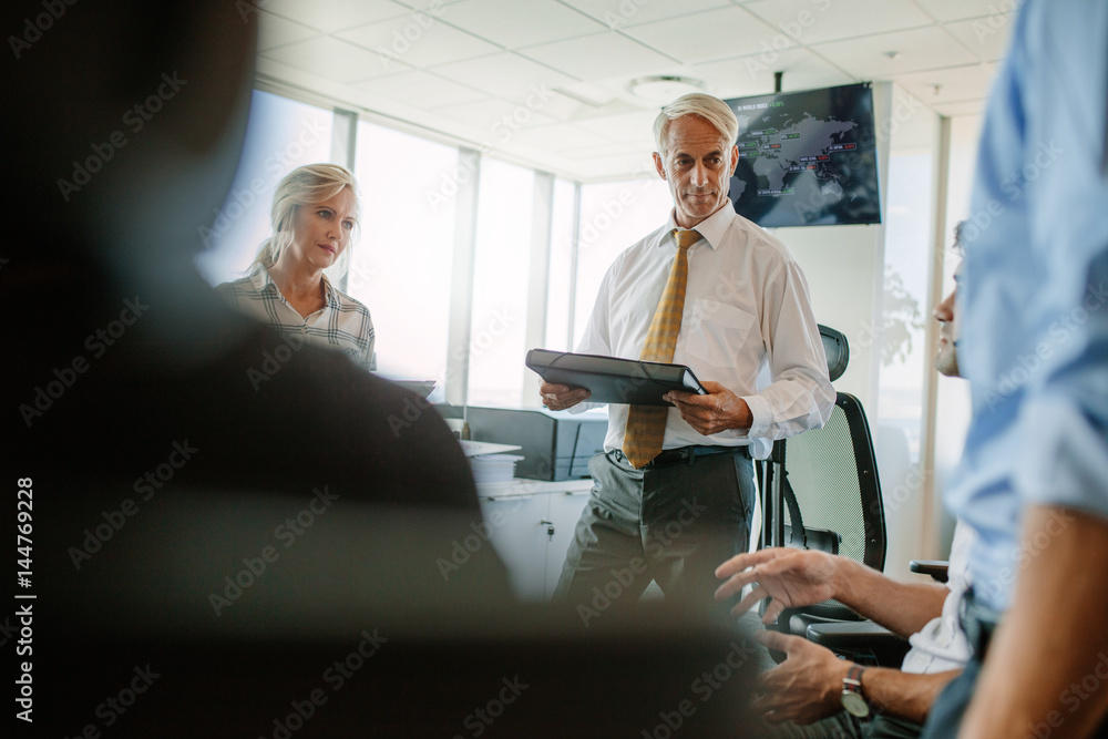 Business professionals having a brainstorming session in office