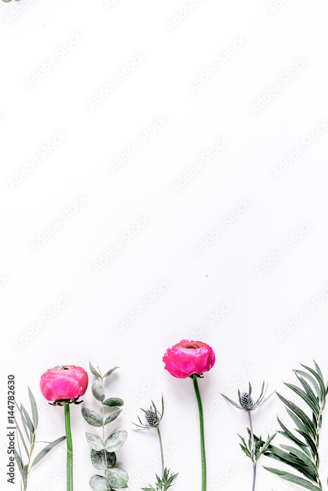 spring with bright flowers mock up on woman desk background top view