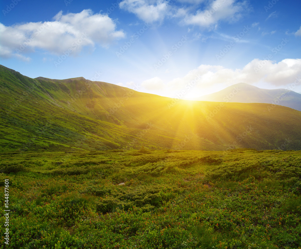 Mountain landscape on sun