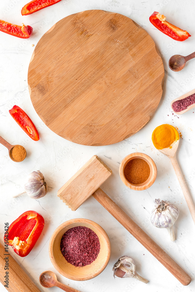 Professional kitchen with spices for cook on white background top view