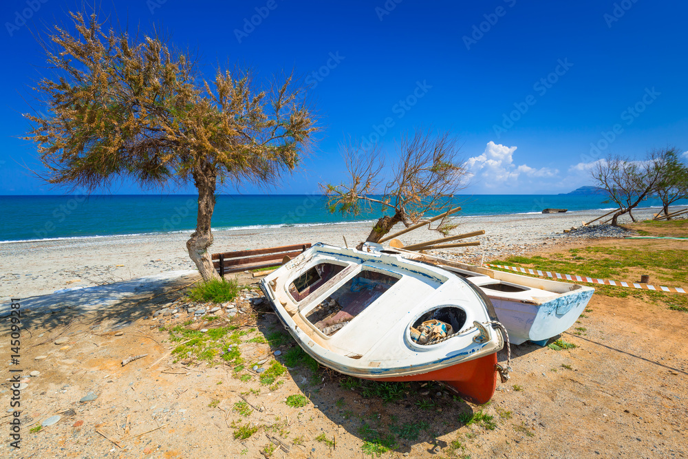 Old boats at Maleme beach on Crete, Greece