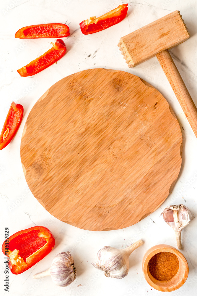 composition of cooking tools and spices on kitchen table top view