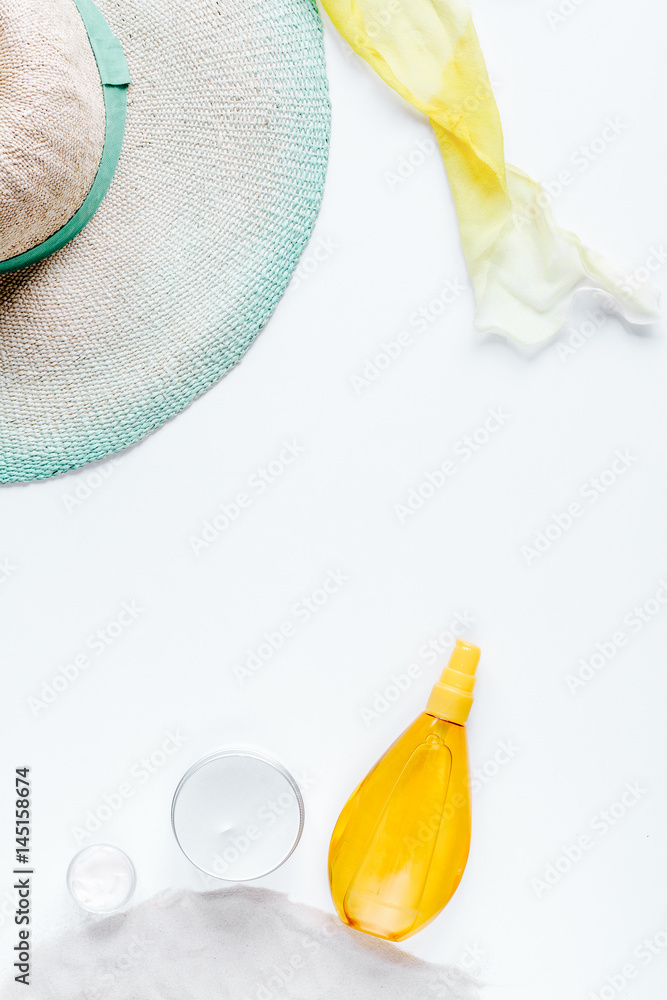 Sun protection concept with cream and lotion white background top view mockup