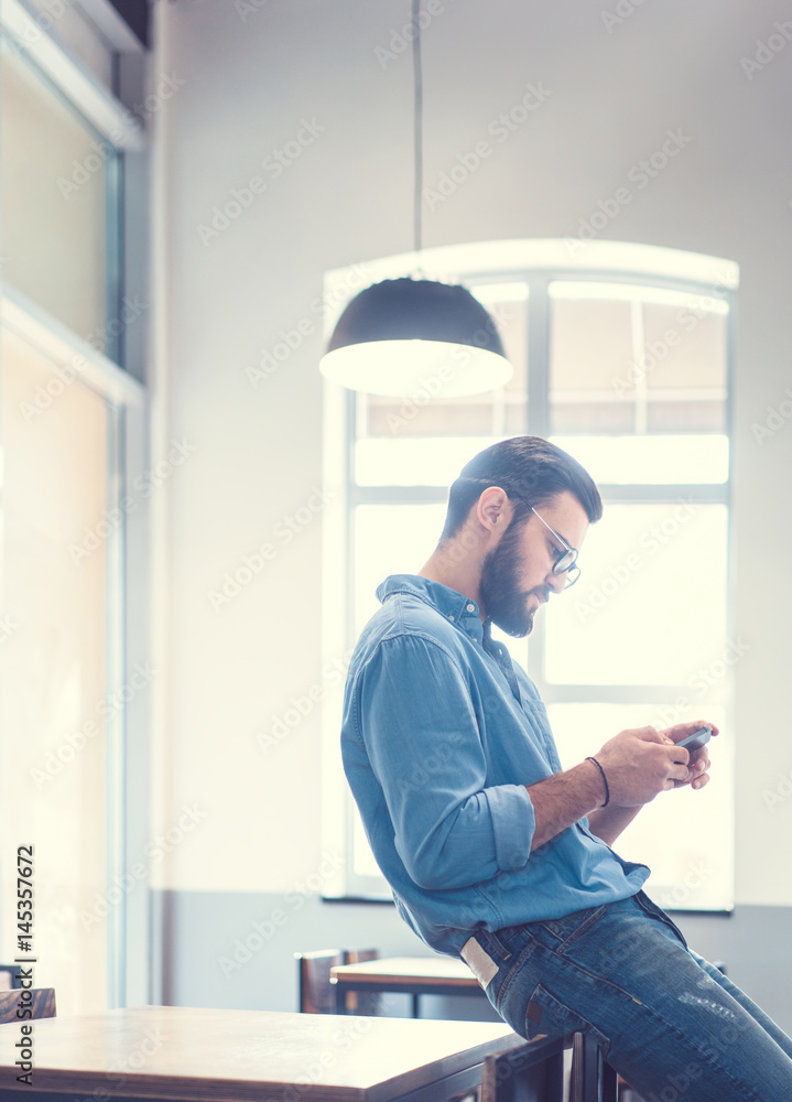 Young man in cafe