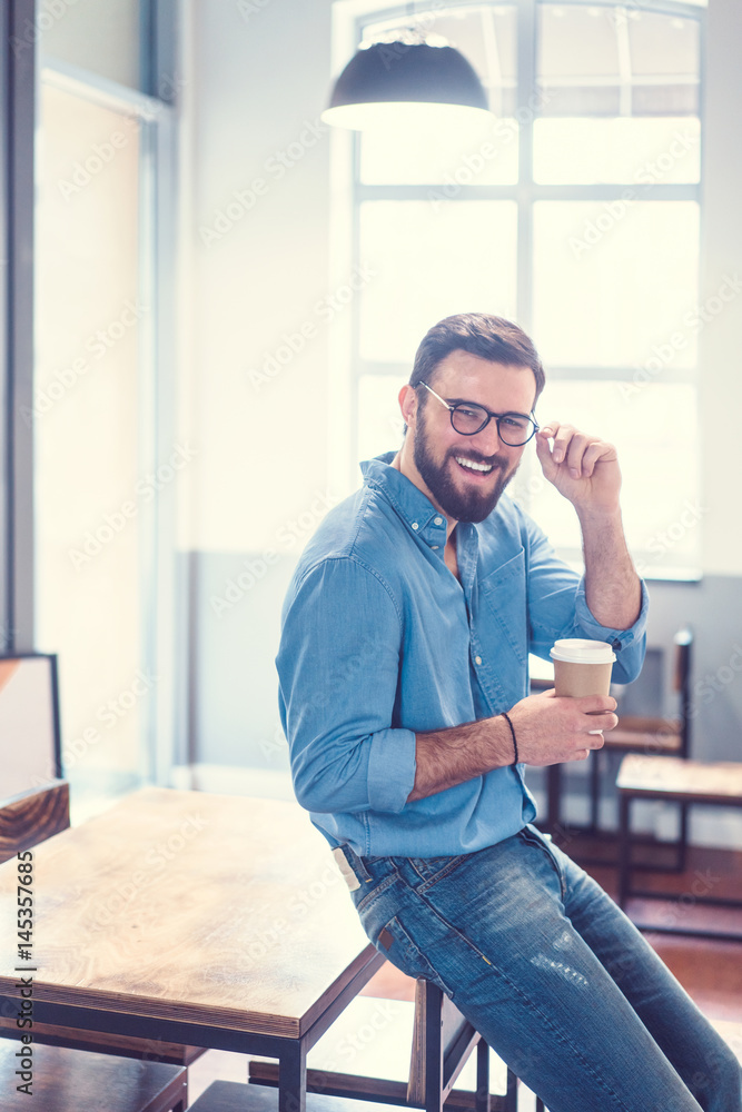 Young man with a cup