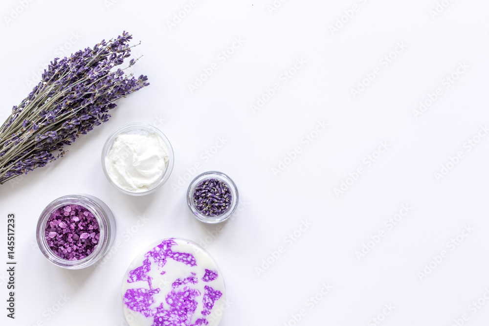 lavender flowers in organic cosmetic set on white background top view mock-up