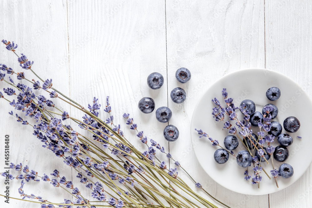 blueberry with lavender design on white background top view space for text