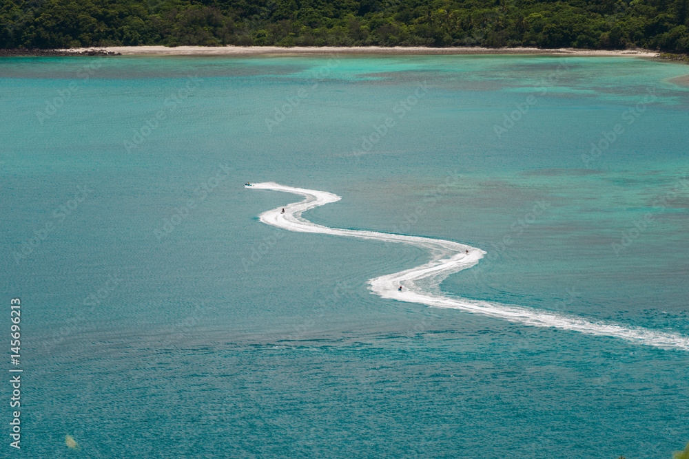 Speedboat racing along the open sea