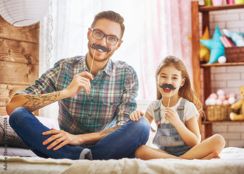 father and daughter play