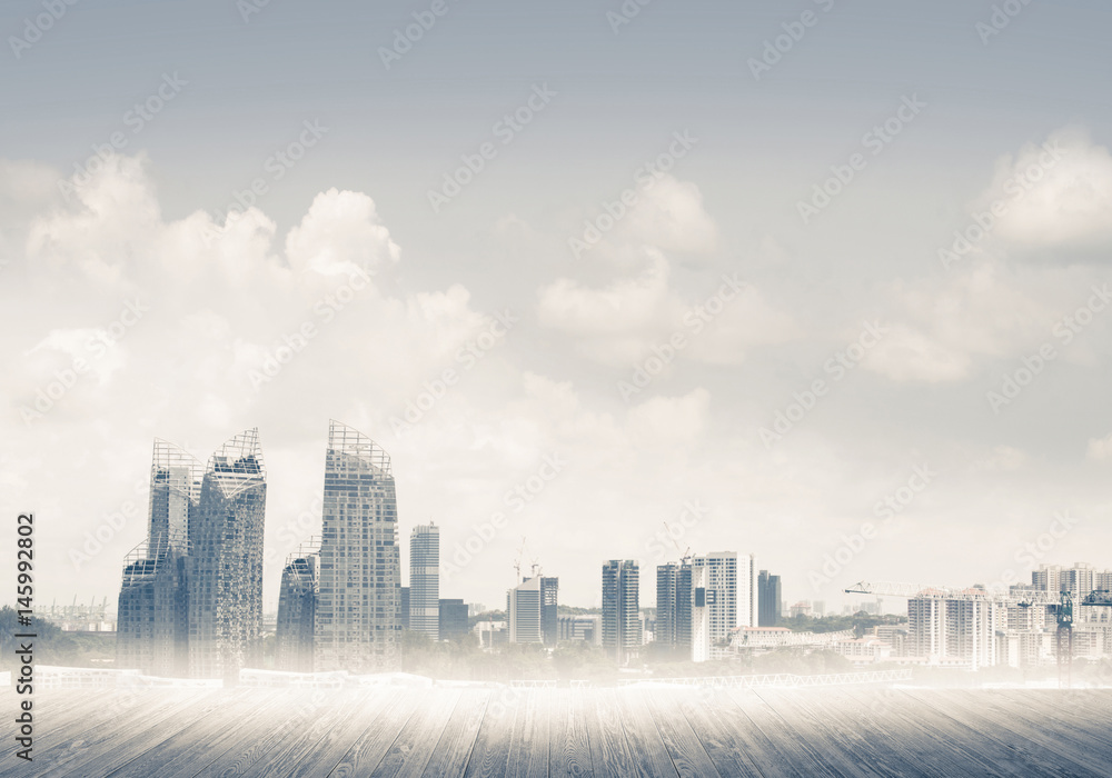 Modern urban buildings skyscrapers blue cloudy sky background an