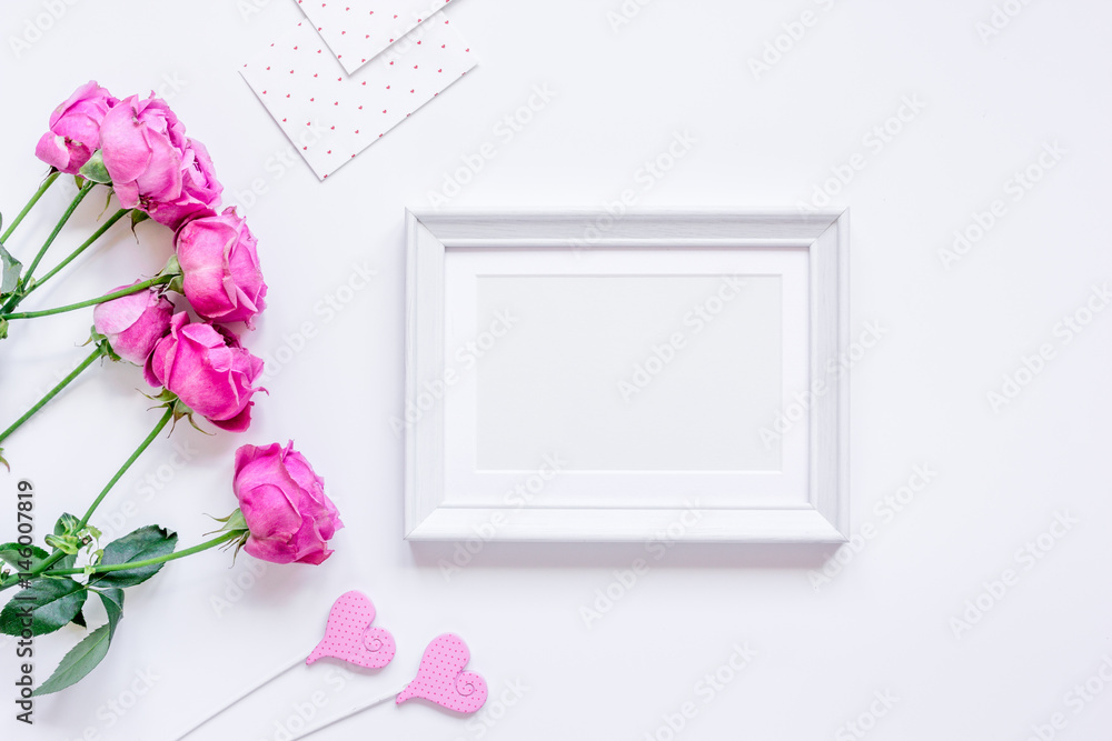 present design with peony bouquet and white frame top view mock up