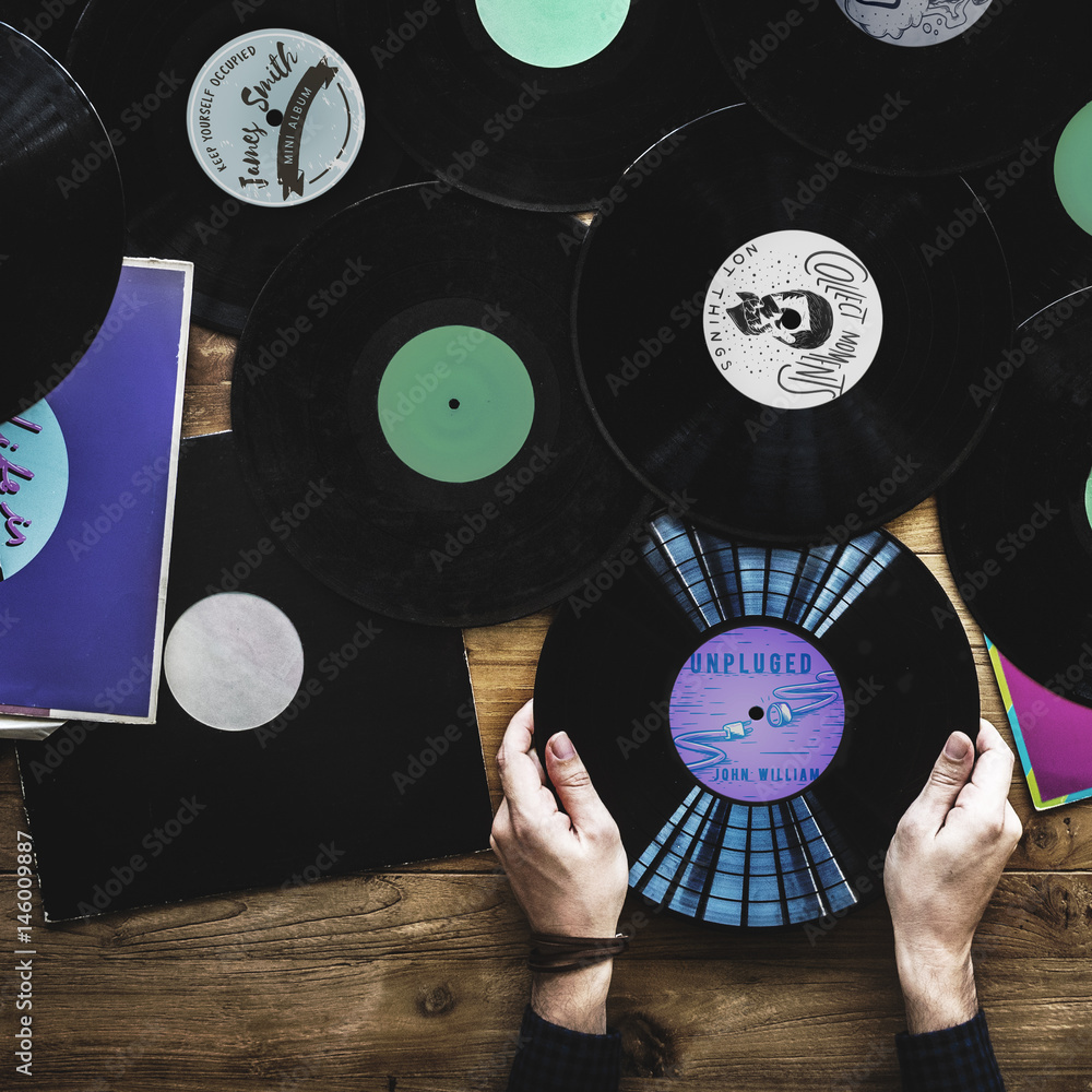 Hands with Vinyl Record Player Music