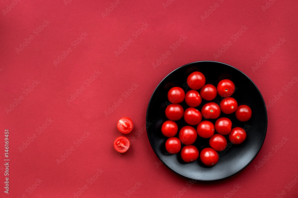 Ripe fresh tomatoes on red background top view mock-up