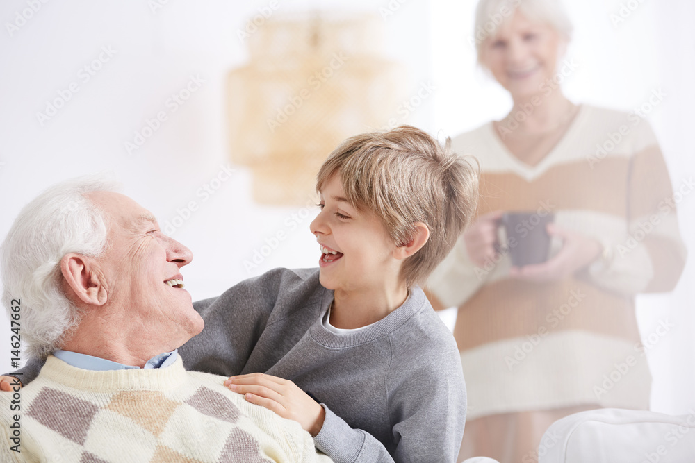 Laughing with grandfather