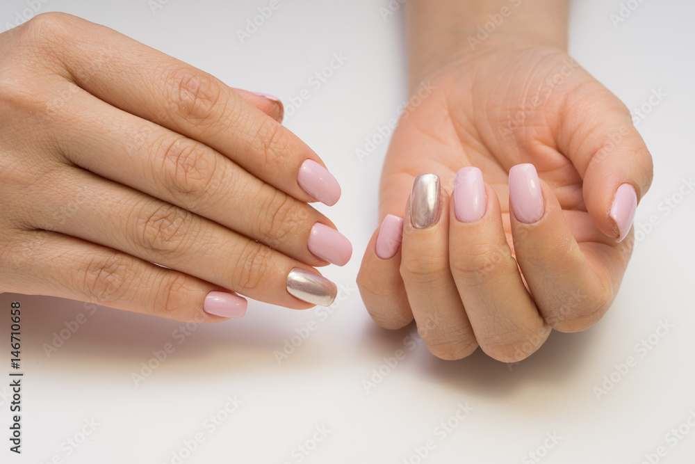 Attractive womens hands. Natural nails with beautiful manicure.