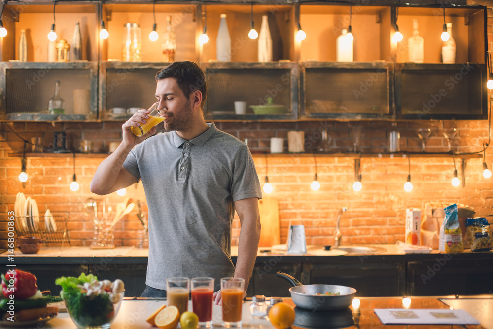 Young man vegan drinking juice healthy lifestyle 