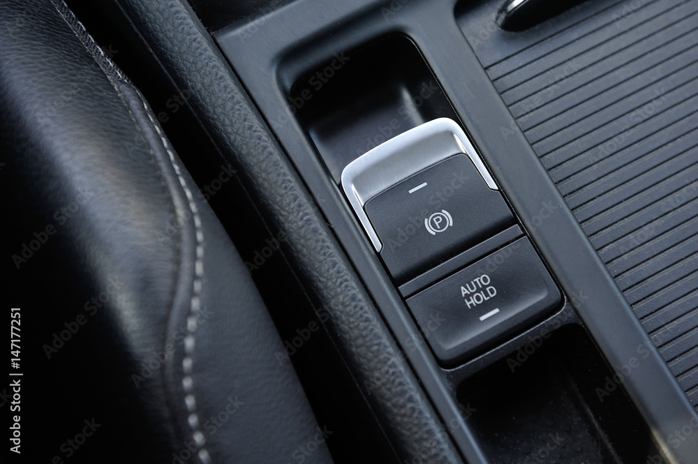 Electronic parking brake button in car