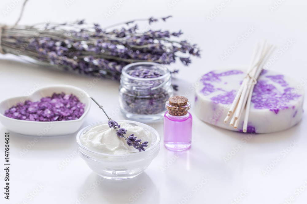 body cream with lavender herbs cosmetic white background