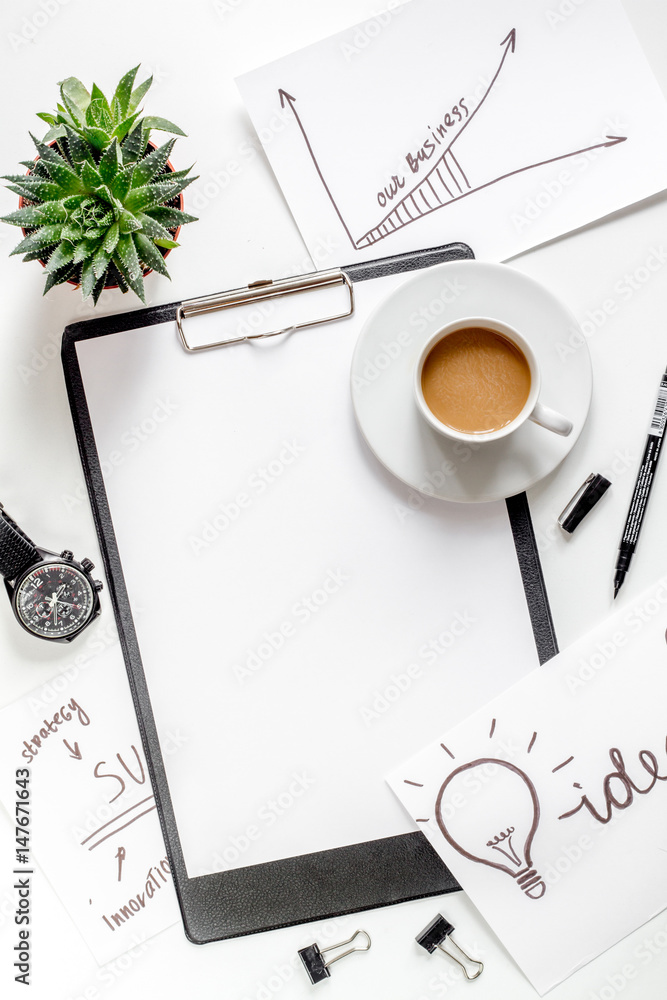 business plan with chart hand-drawn on white table background top view mockup