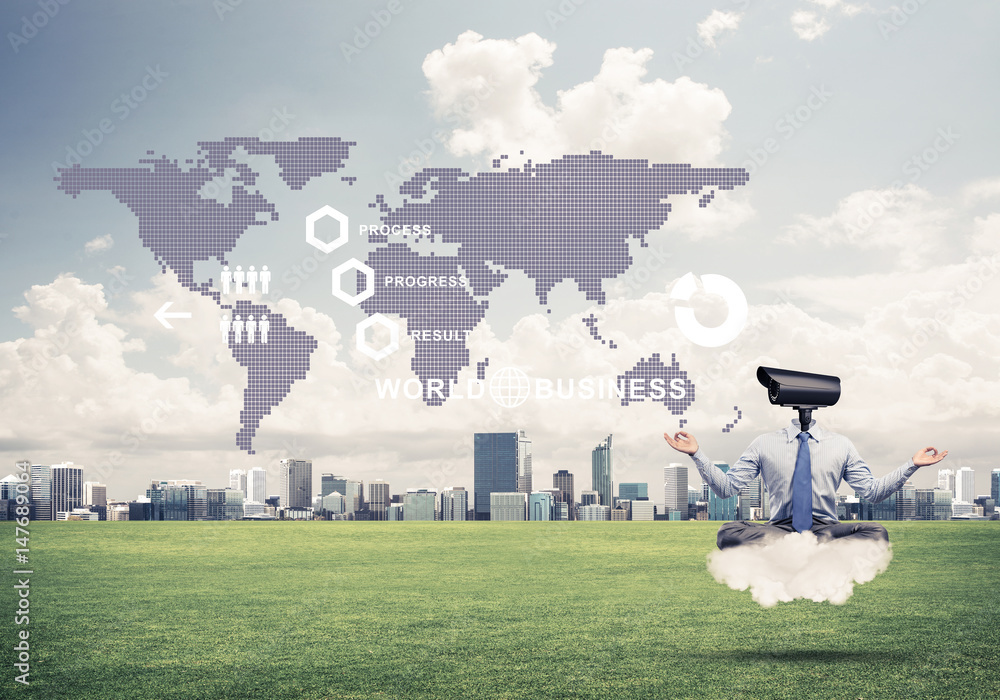 Camera headed man sitting in lotus pose on cloud against modern 