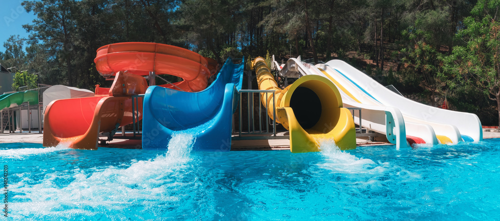 colorful aquapark in green forest