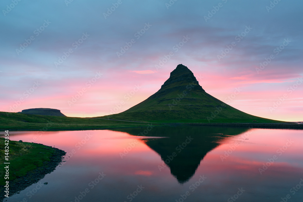 Colorful sunrise on Kirkjufellsfoss waterfall