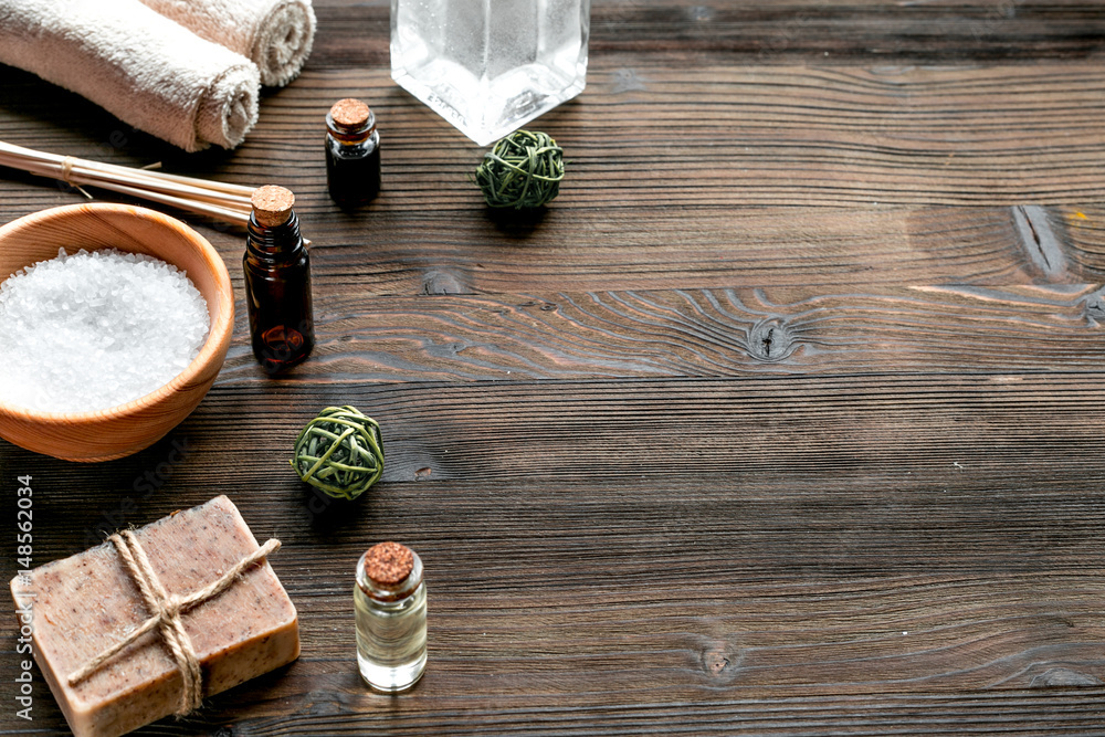 bathroom salt and natural soap for spa on wooden background mock-up