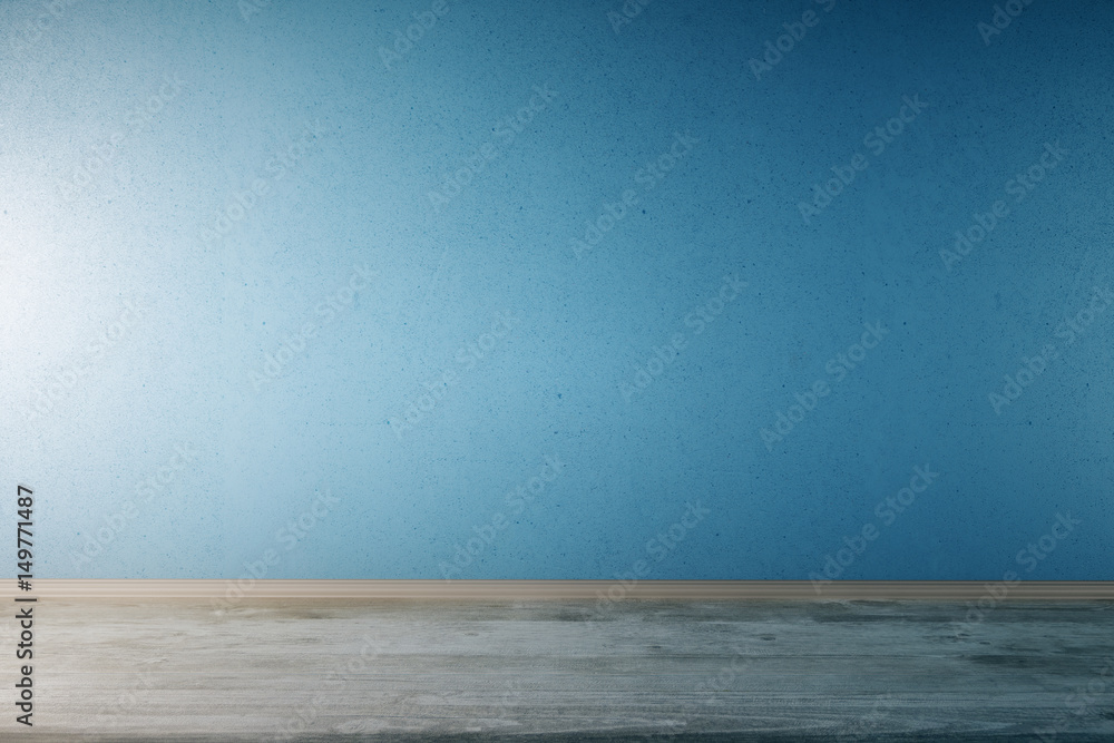 Room with blue wall and wooden floor