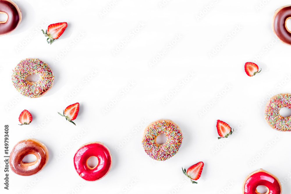 lunch with donuts and strawberry on white background top view mock up