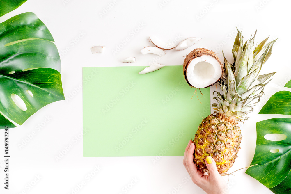 summer dessert with pineapples and coconut on white background top view mock up