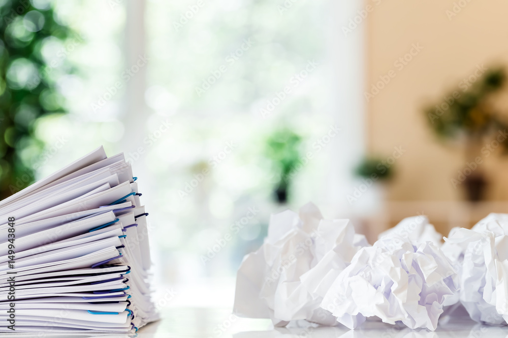 Pile of papers organized with paper clips