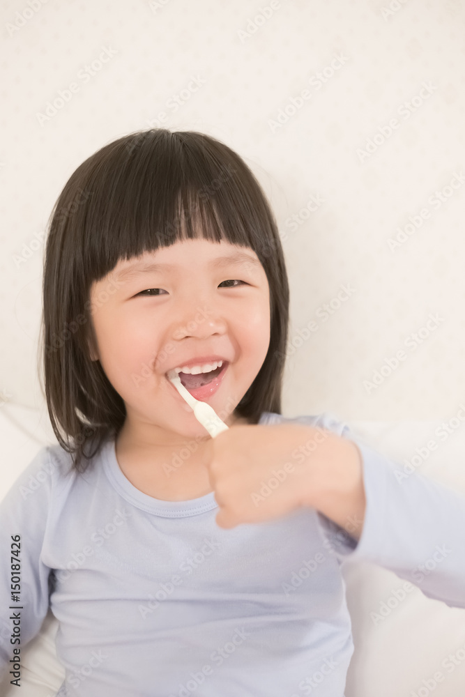 cute girl brush teeth