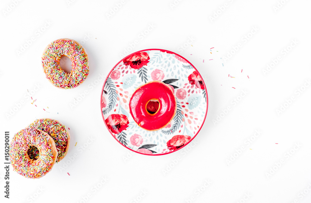 lunch with donuts on plate white table background top view mock up