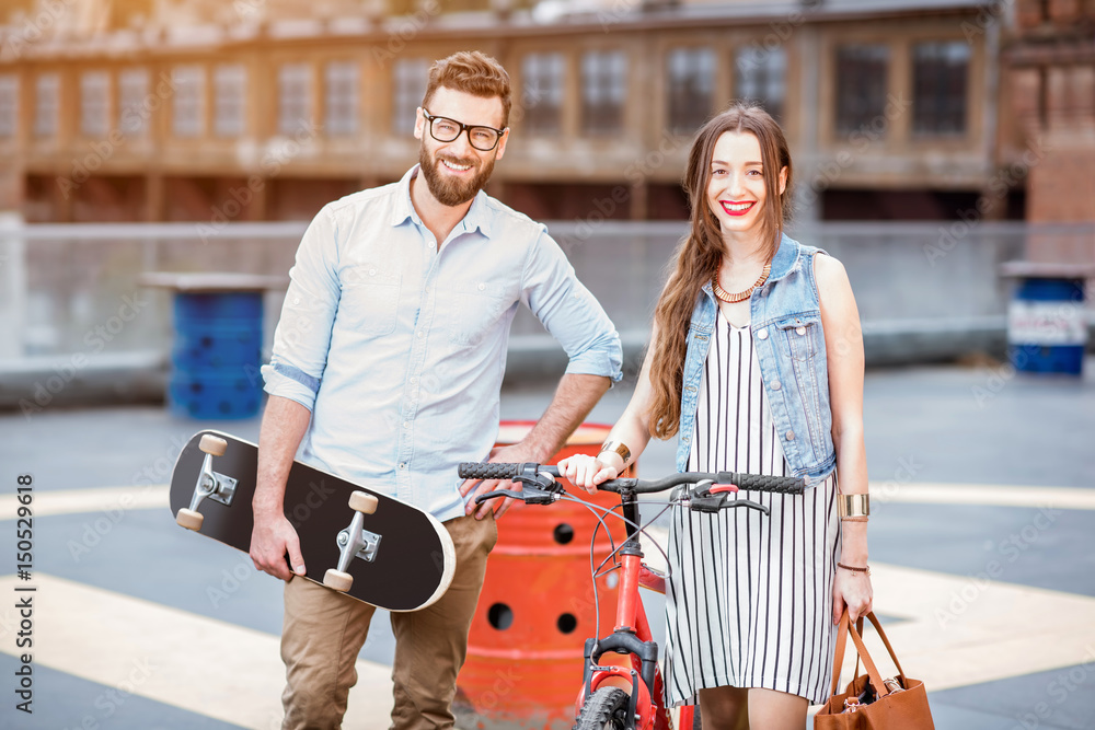 Business couple outdoors on the playground