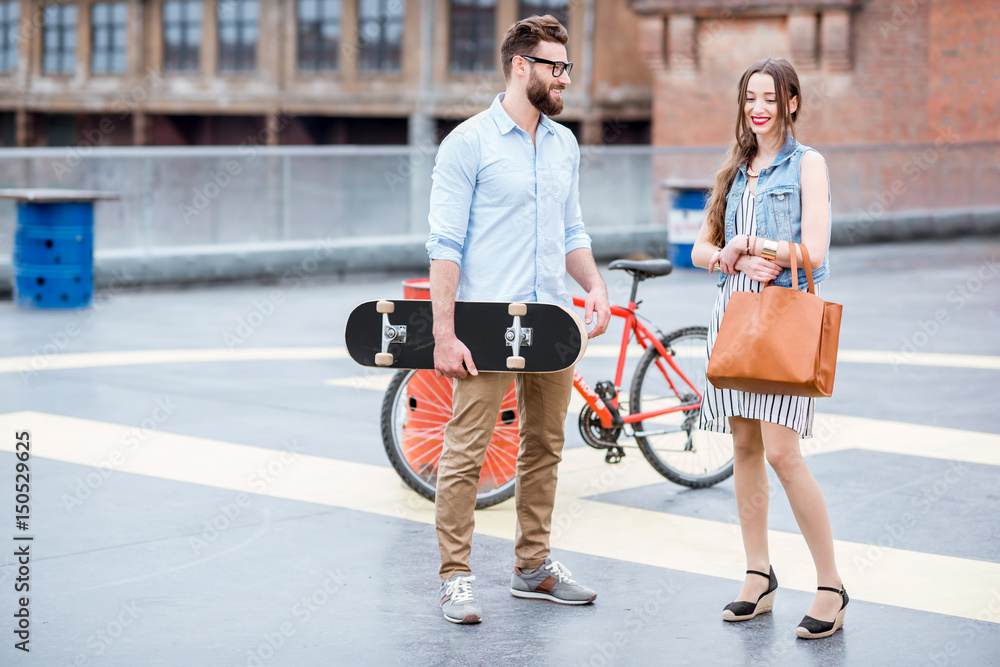 Business couple outdoors on the playground