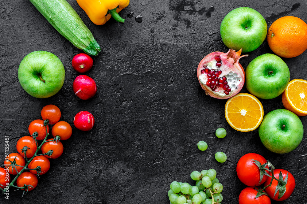 diet food with fresh fruits and vegetables salad dark background top view mockup