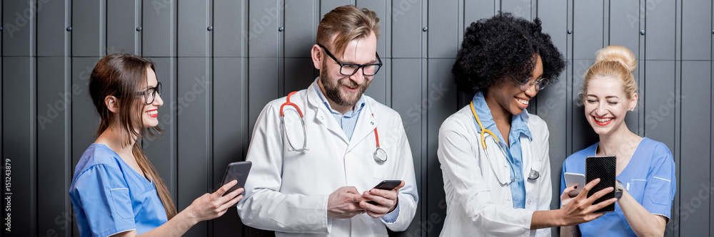 Medics with phones indoors