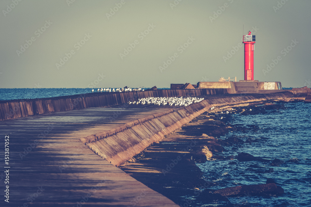 Breakwater dam with lighthouse